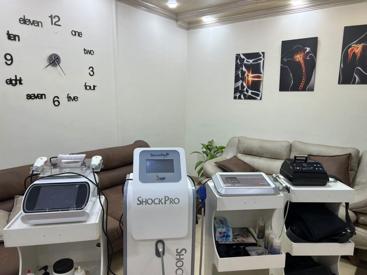 Original clinic photograph showing four therapy devices
